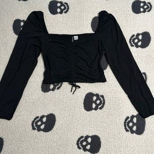 Black divided crop top.